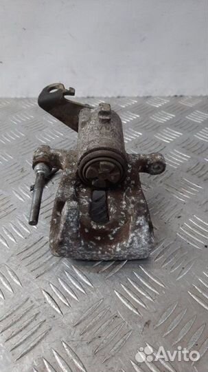 Суппорт тормозной задний правый Renault Scenic