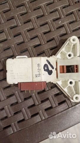 Замок люка на стиральную машину