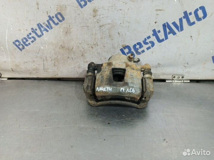 Суппорт тормозной передний левый Chevrolet Lacetti