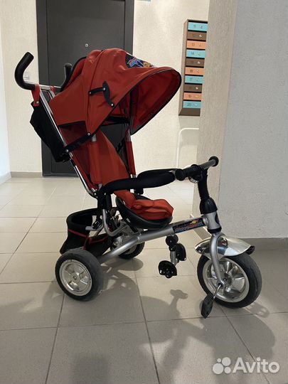 Детский трехколесный велосипед с ручкой