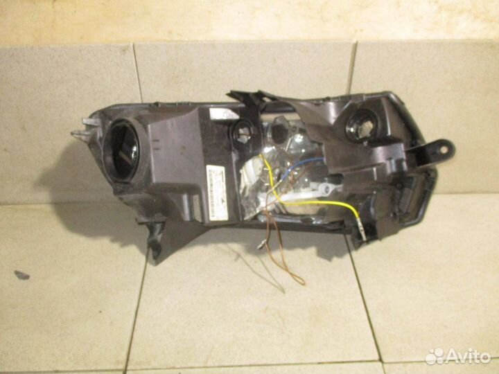 Стекло фары левой Renault Logan 2