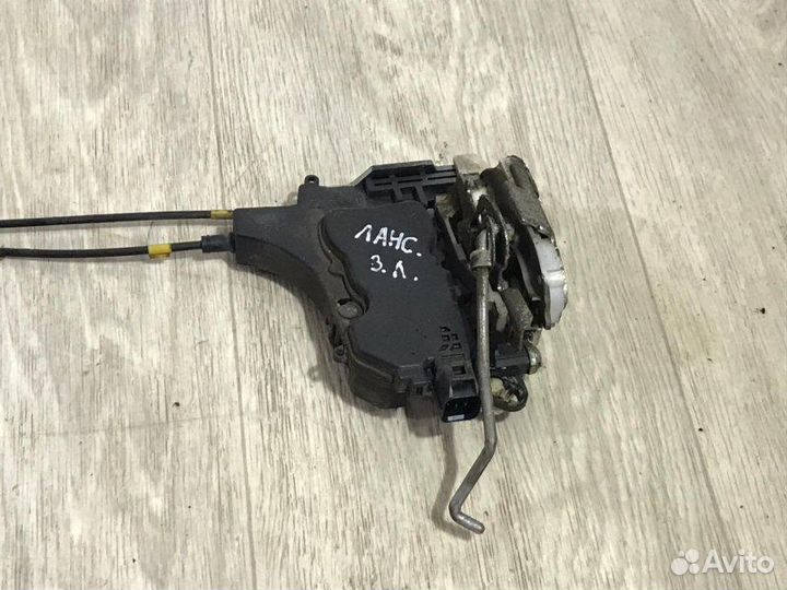 Замок двери задний левый Mitsubishi Lancer 10