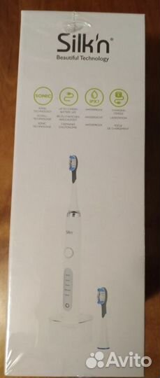 Электрическая зубная щетка