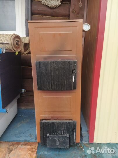 Твердотопливный -газовый котел изтм