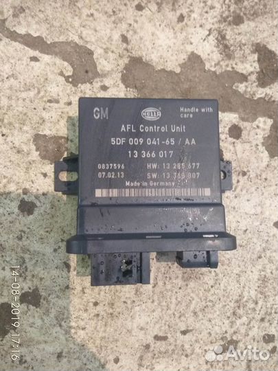 Блок управления светом на Опель астру J 2013 года