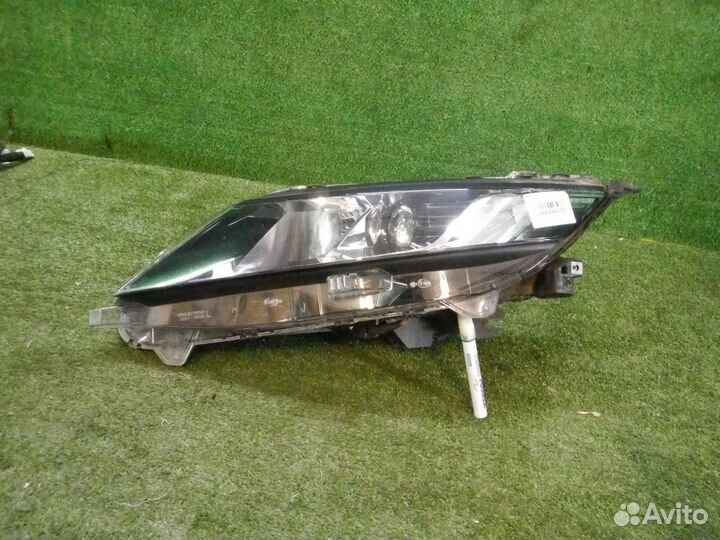 Фара левая Mitsubishi L200