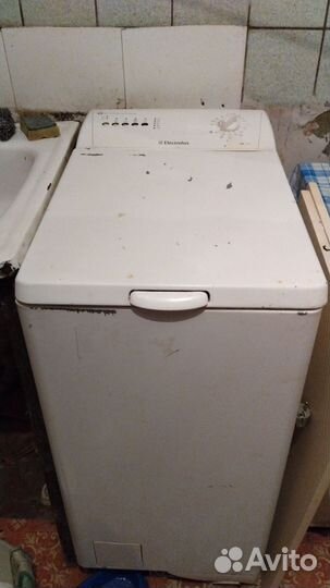 Стиральная машина с вертикальной загрузкой