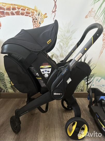 Коляска автокресло Doona с базой isofix
