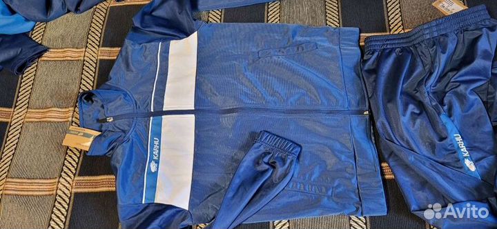 Лыж.костюмы karhu S-M L-XL Сб.России разминочные