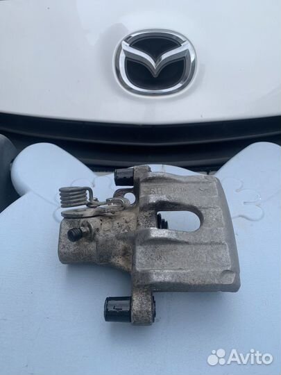 Суппорт Мазда 3 bl задний правый