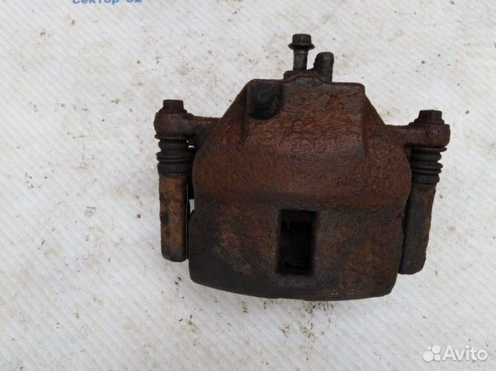 Суппорт тормозной передний правый Nissan Almera N1