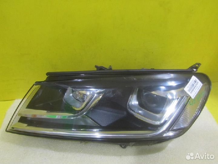 Фара левая Volkswagen Touareg