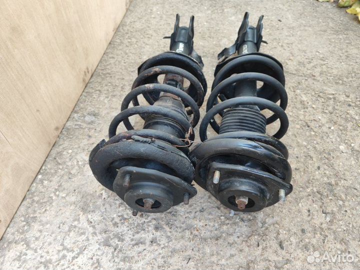 Стойка подвески передняя Nissan Sunny FB14 GA16