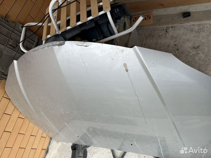 Капот на Mazda Axella bkep