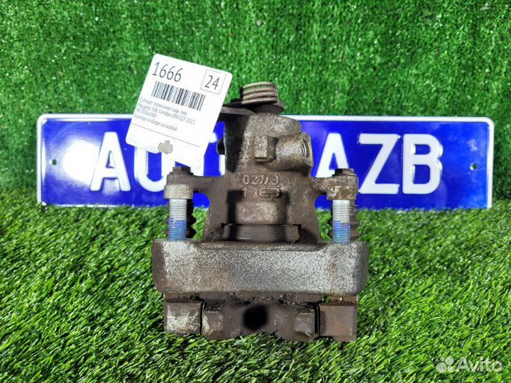 Суппорт тормозной задний левый Peugeot 308 хэтчбек