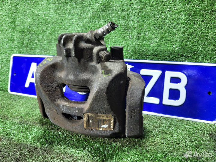 Суппорт тормозной передний левый Peugeot 308