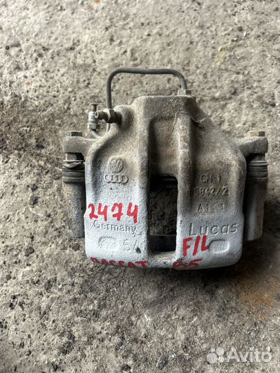 Тормозной суппорт левый passat b5