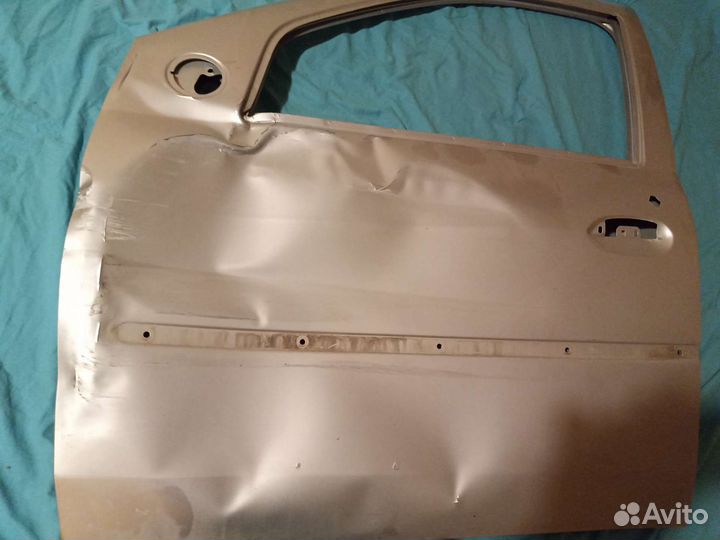 Рено Логан левая передняя дверь и крыло