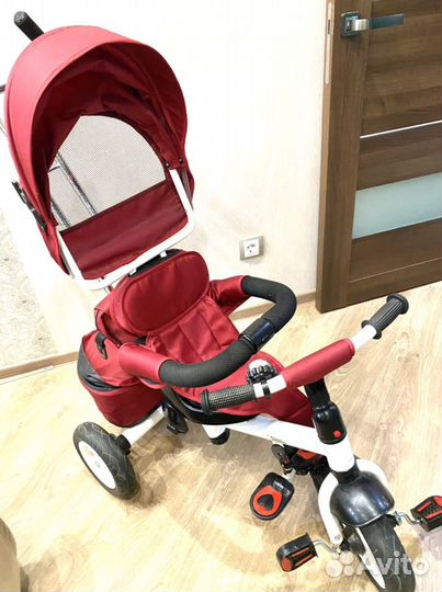 Трехколесный велосипед с ручкой