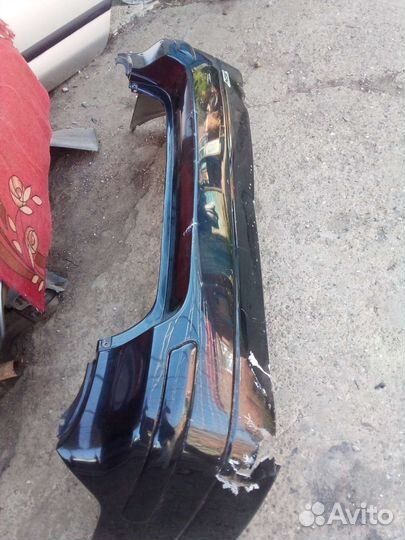 Задний бампер Suzuki Liana 2006г рестайлинг