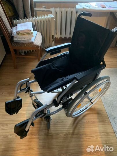 Регулируемая кресло - коляска для инвалида