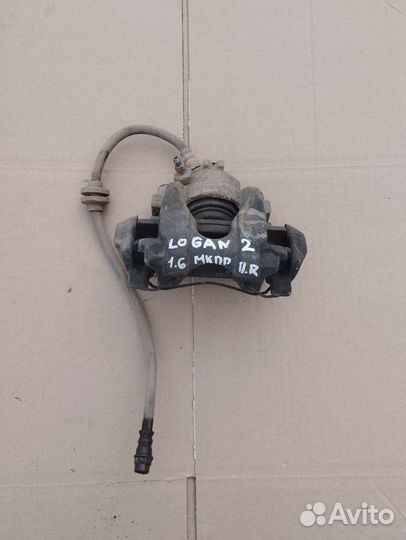 Суппорт передний правый Renault Logan 2