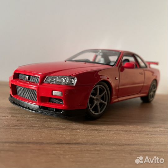Модель Nissan Skyline GT-R R34 Welly 1:24
