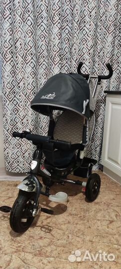 Трехколесный велосипед с родительской ручкой