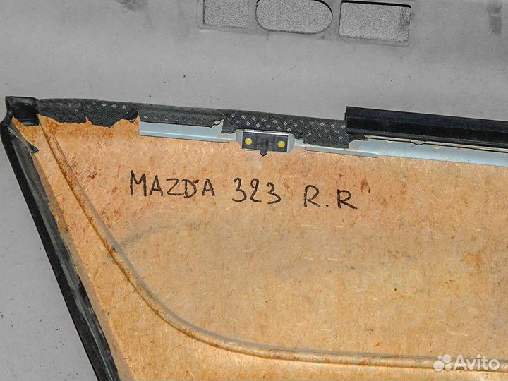 Обшивка двери задней правой Mazda 323F BJ