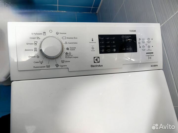 Стиральная машина с вертикальной загрузкой