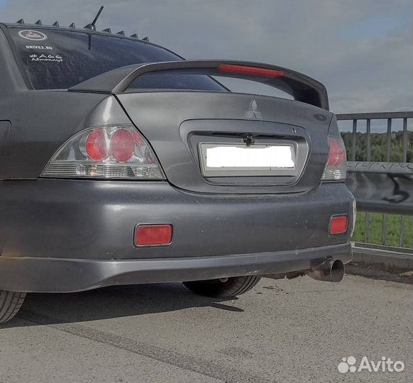 Спойлер лансер 9 на крышку багажника