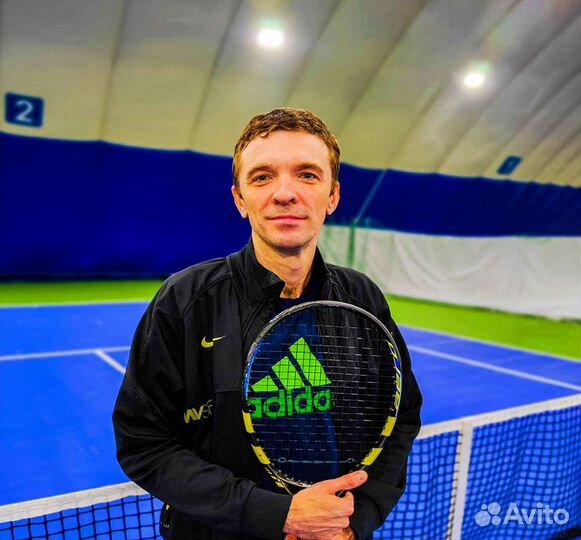 Тренер по большому теннису