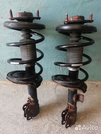 Передние стойки Lancer 10