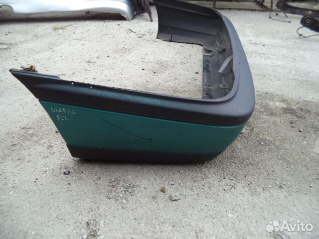 Бампер задний Ниссан Сани