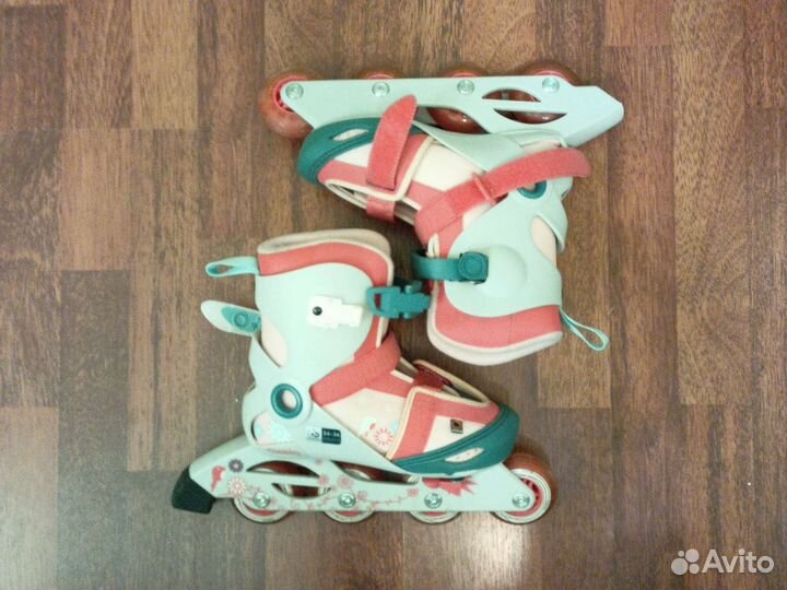 Роликовые коньки