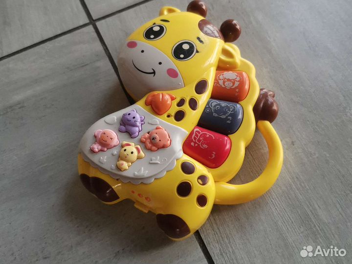 Развивающие игрушки. Погремушка-прорезыватель