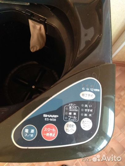 Стиральная машинка с вертикальной загрузкой