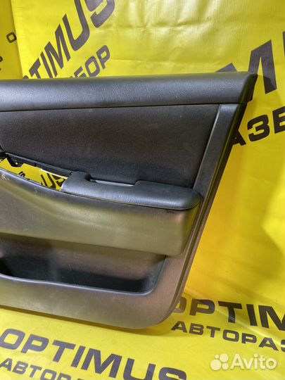 Обшивка передней правой двери Toyota Corolla E120