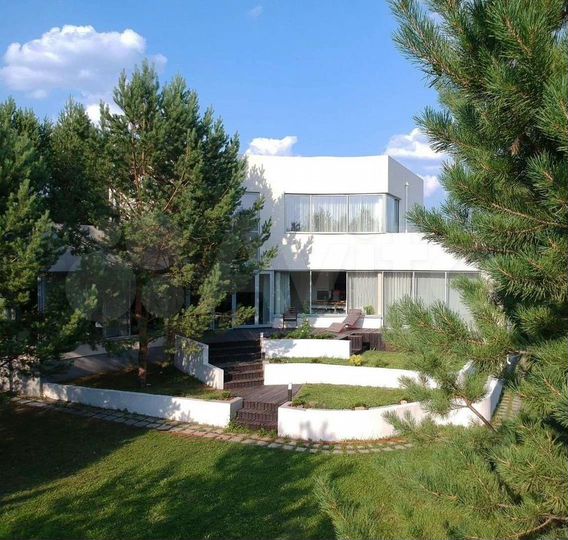 Коттедж 340 м² на участке 20 сот.