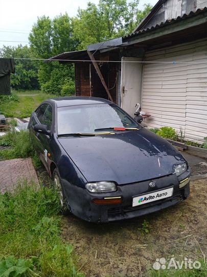 Mazda 323 1.5 МТ, 1995, 215 329 км