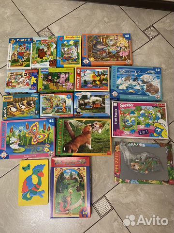 Продам 26 коробок паззлов