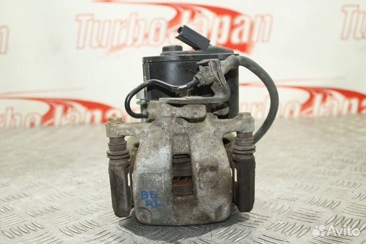 Суппорт задний левый Volkswagen Passat B6