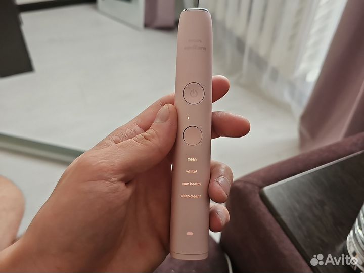 Электрическая зубная щетка