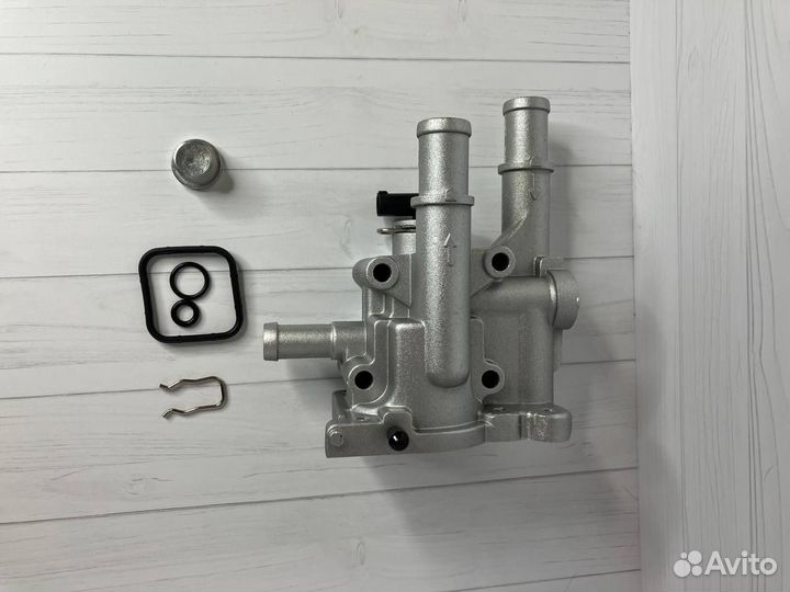 Корпус термостата Opel, Chevrolet - Новый