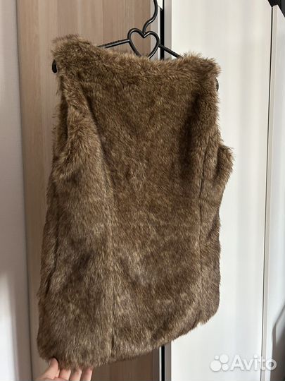 Меховая жилетка