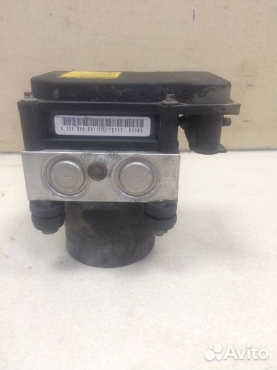 Блок ABS (насос) Toyota Camry