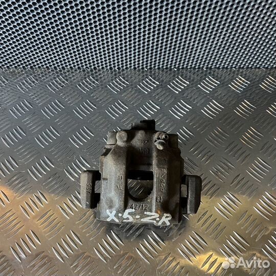 Суппорт тормозной задний правый BMW X5