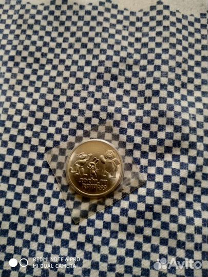 Монета новая