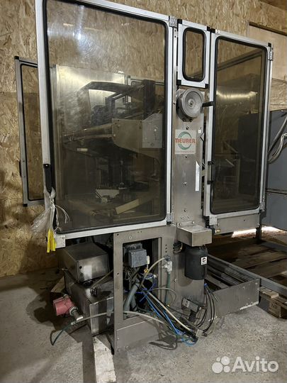 Термоупаковочный аппарат автомат с группиратором