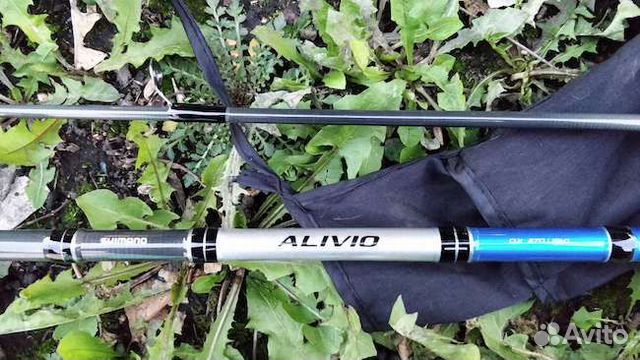 Спиннинг Shimano Alivio DX 240 medium C.W.3-15g